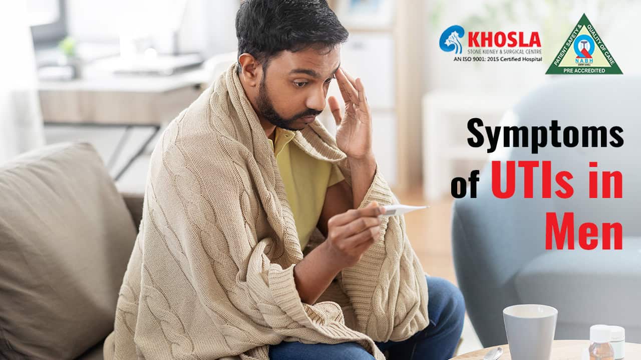 Seated man examining thermometer, health concern, Khosla Stone Kidney & Surgical Centre.